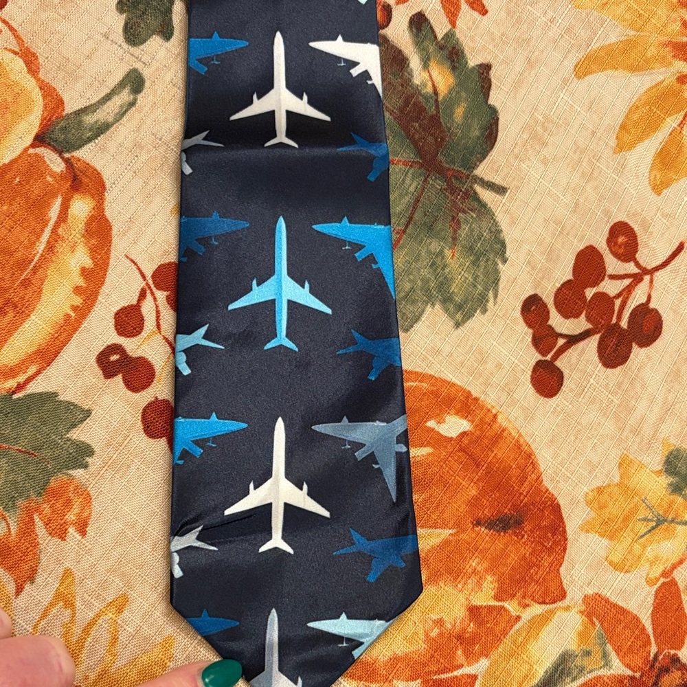 Brand new 100% polyester aviation plane tie blue silky texture. Pilot gift